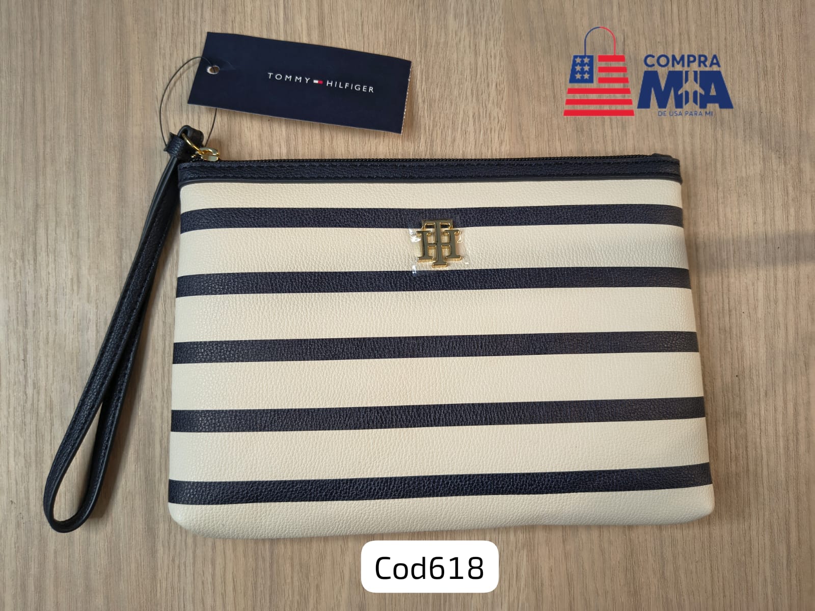 Muñequera Th Blanco con azul lineas 