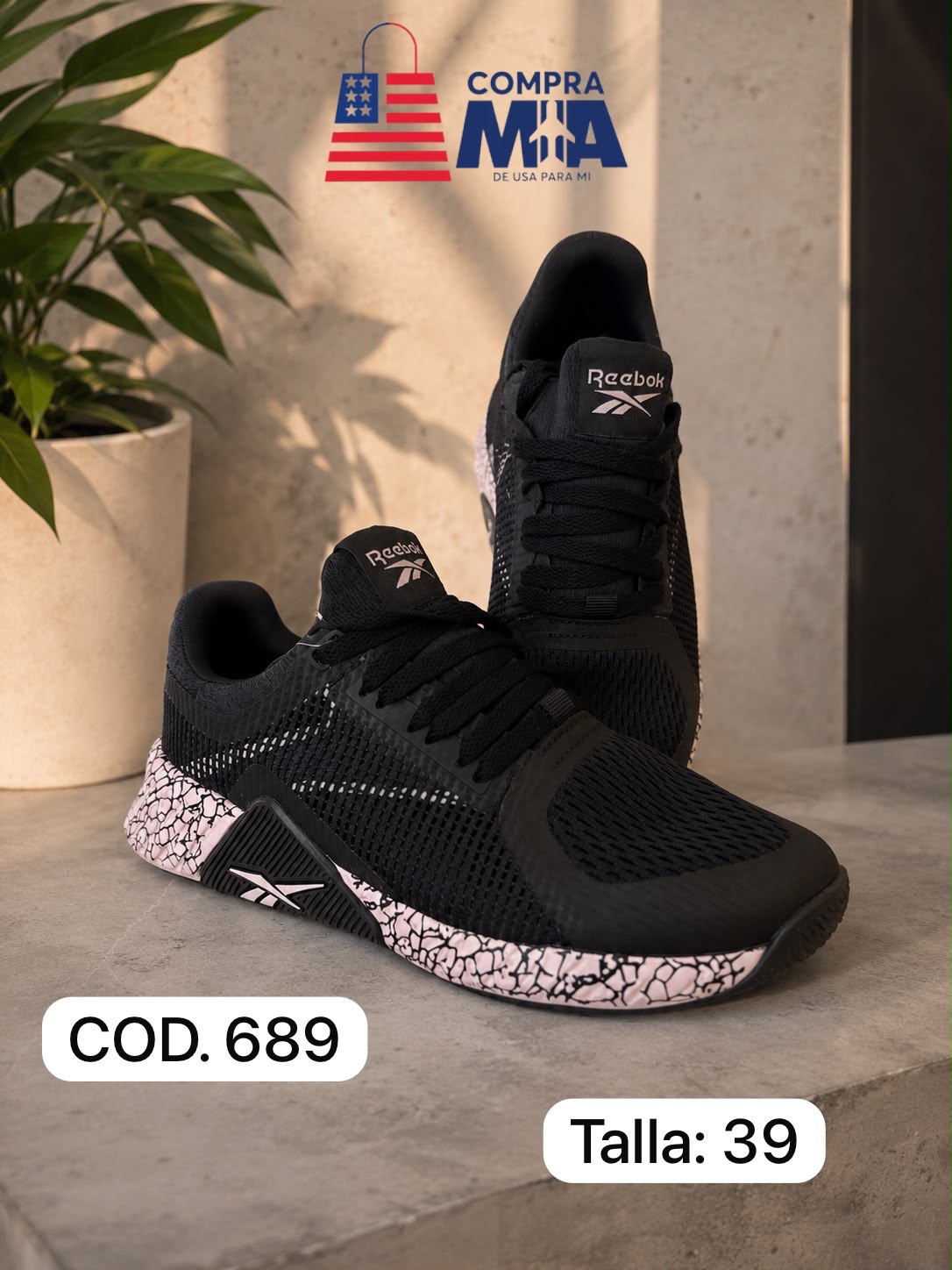 Zapatillas Reebok Negros con suela rosada 38