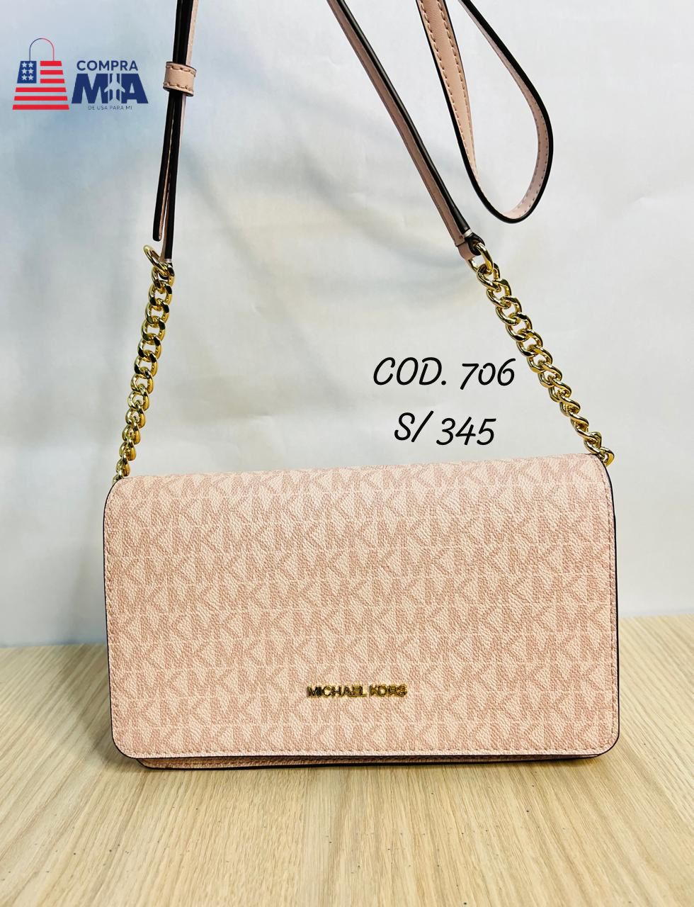 CROSSBODY ROSADO CON MONOGRAMA