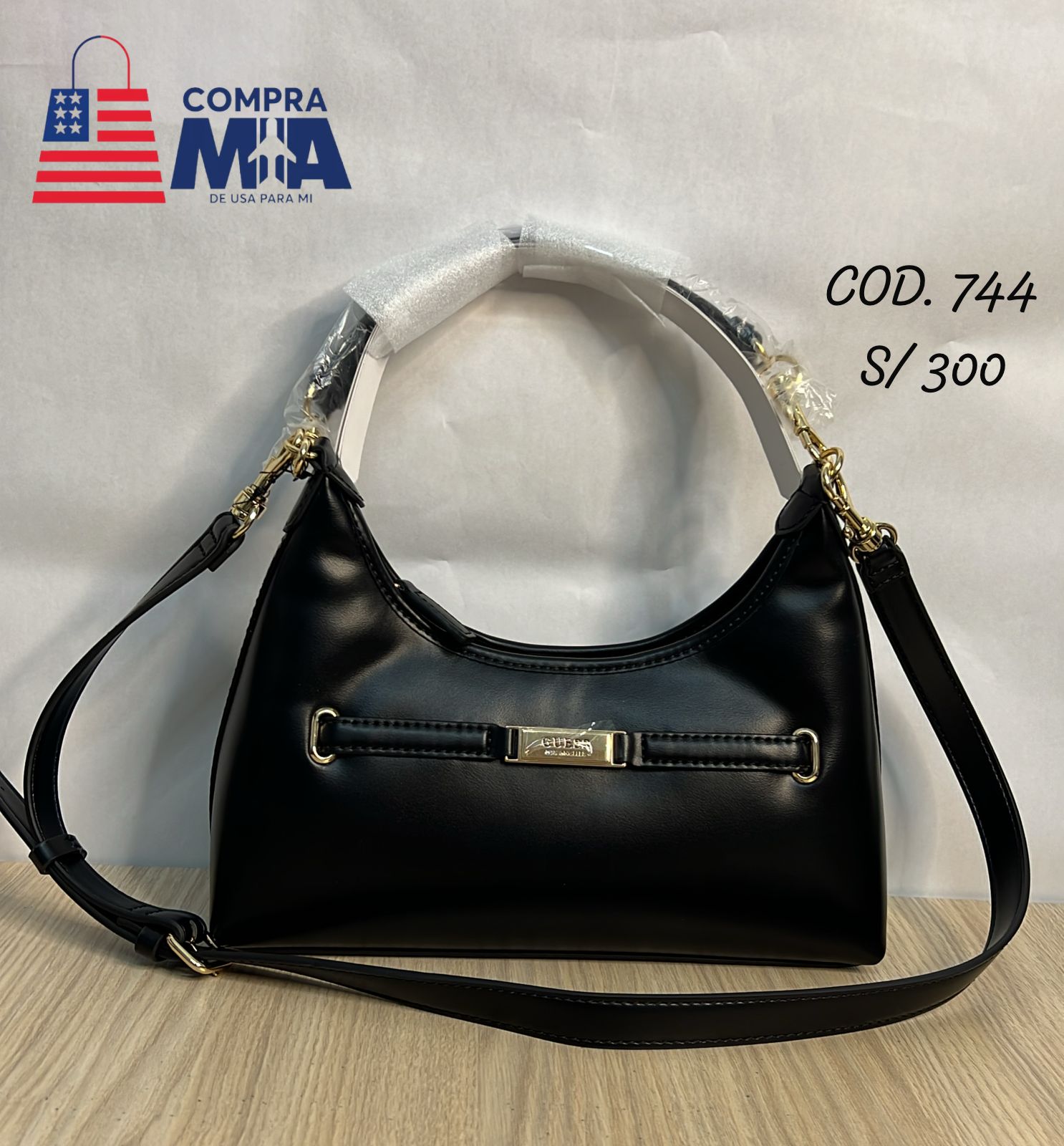 Bolso Baguette negro elegante con dorado 