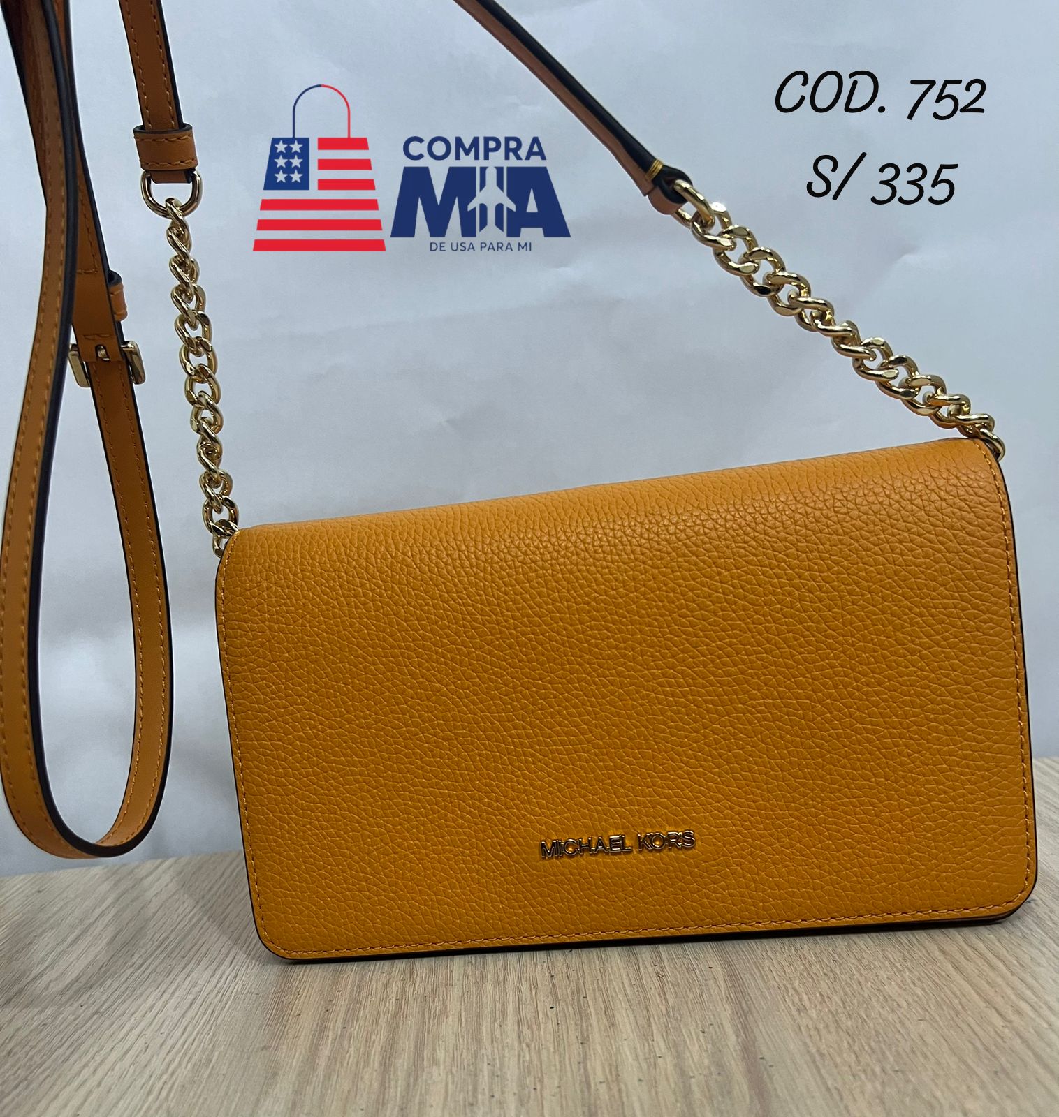 crossbody naranja con dorado