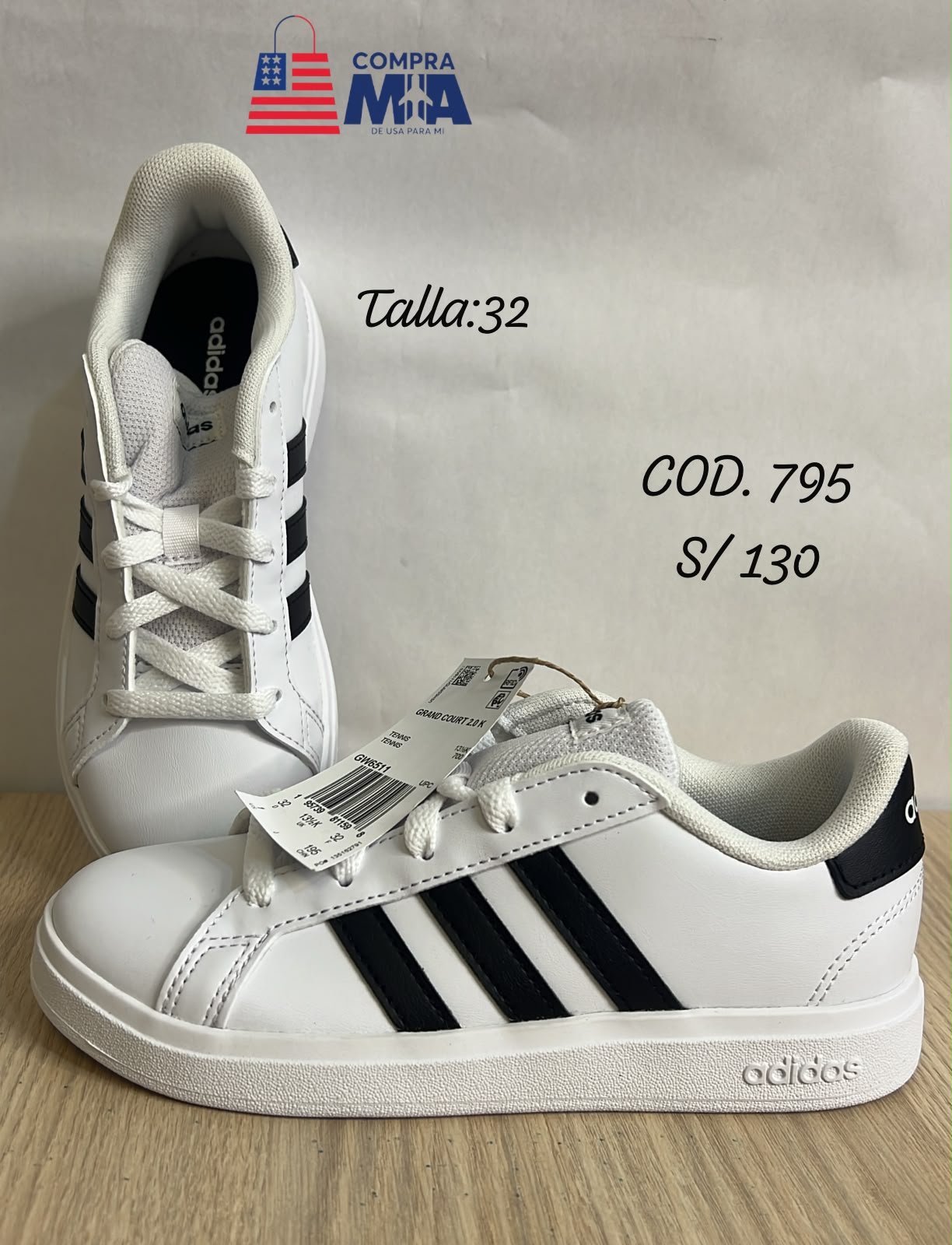 zapatilla niño color blanco con negro, suela blanca talla 32