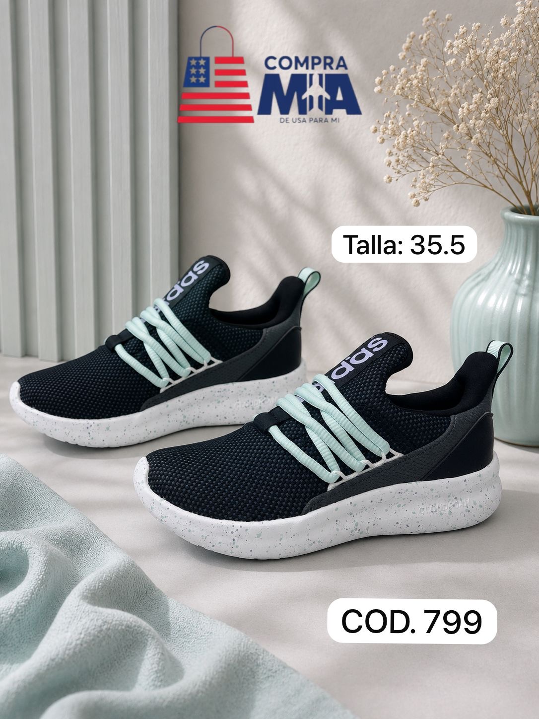 zapatillas niño tela negro con gris, suela blanca y puntos verdes con gris talla 35.5
