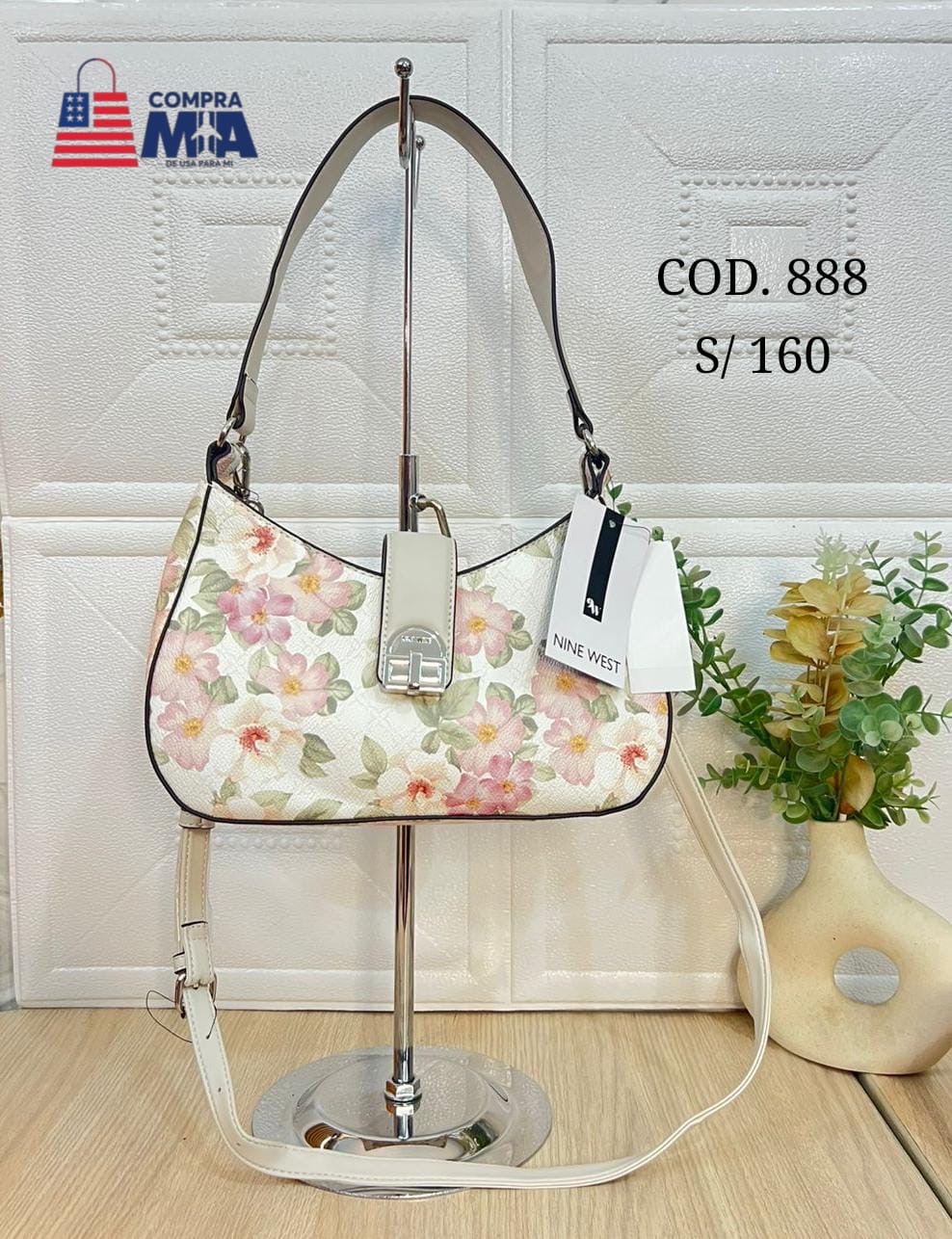 CARTERA BAGUETTE CON FLORES COLOR HUESO