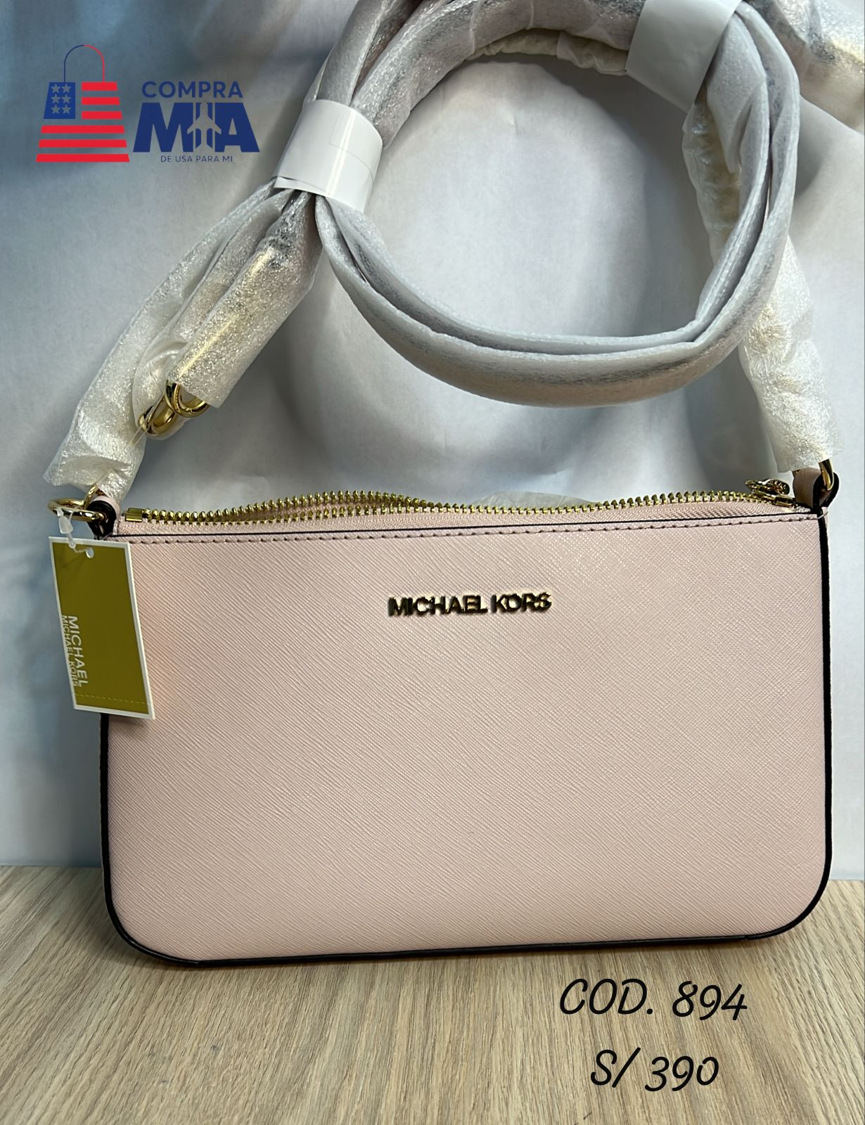 crossbody rosado con cadena dorado mk 